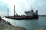 A dredge at the Fort pierce Inlet on a sunny afternoon.